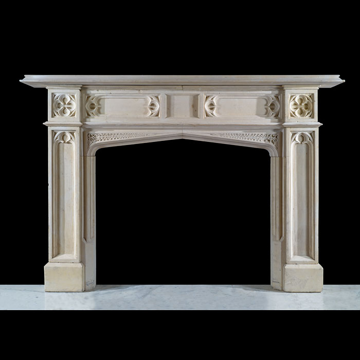 A Large Gothic Revival Limestone Fireplace