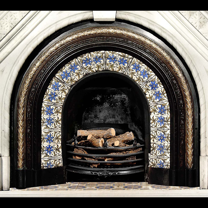 A Victorian tiled arched antique register grate     