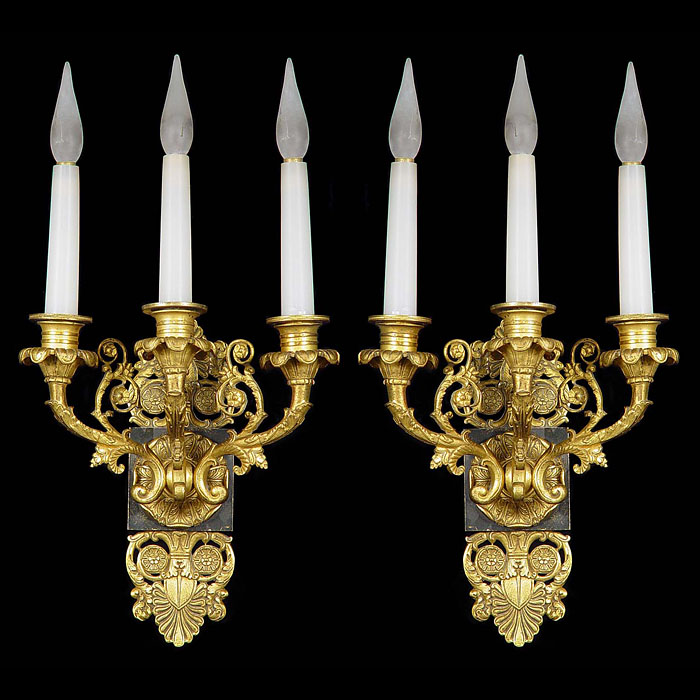 Small pair of three branch Louis XVI style wall lights    